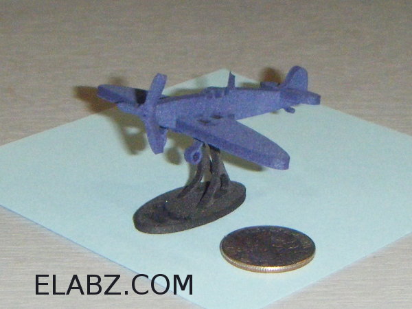 Postal stamp sized laser cut model of Supermarine Spitfire MKII