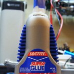 Use gel type of superglue - easier to work with