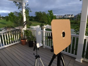 Sun viewing setup. Monocular projects the image onto a white screen.